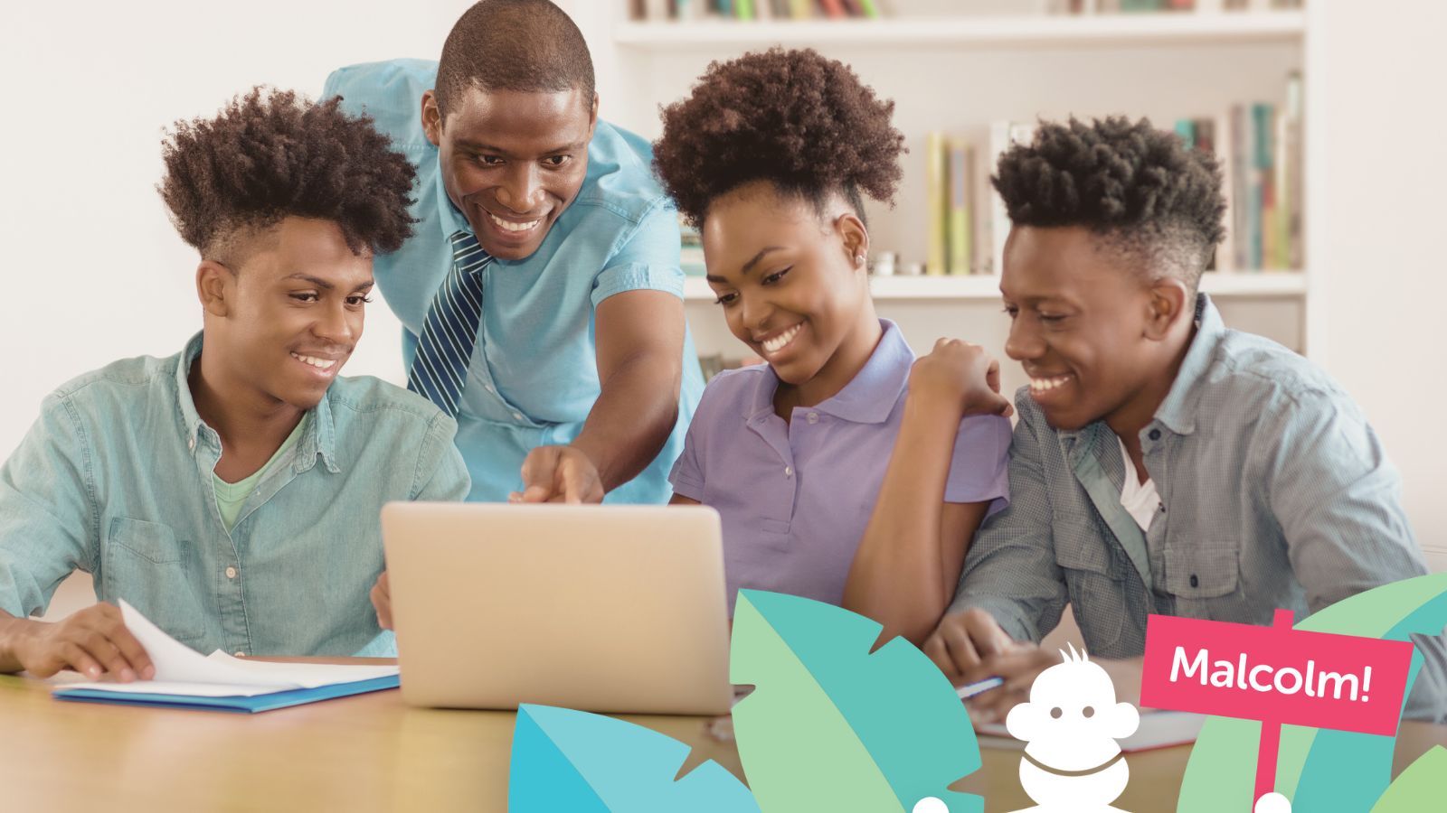 Students looking at computer